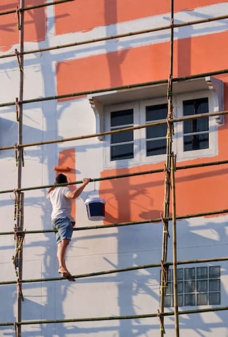 asian-builder-worker-on-wooden-scaffolding-is-pain-2025-03-10-17-22-44-utc (1).jpg